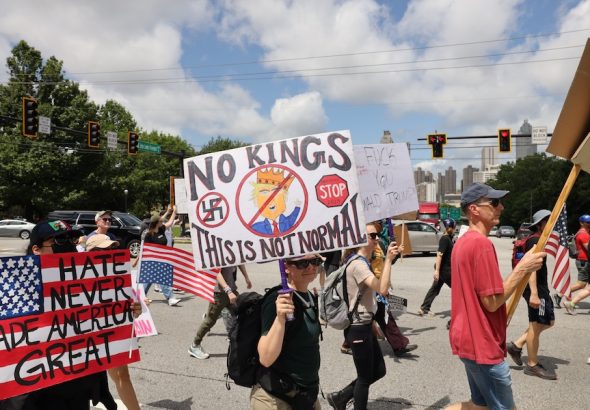 Demonstrators,Hold,Up,Signs,During,The,ìno,Kingsî,Protest,In