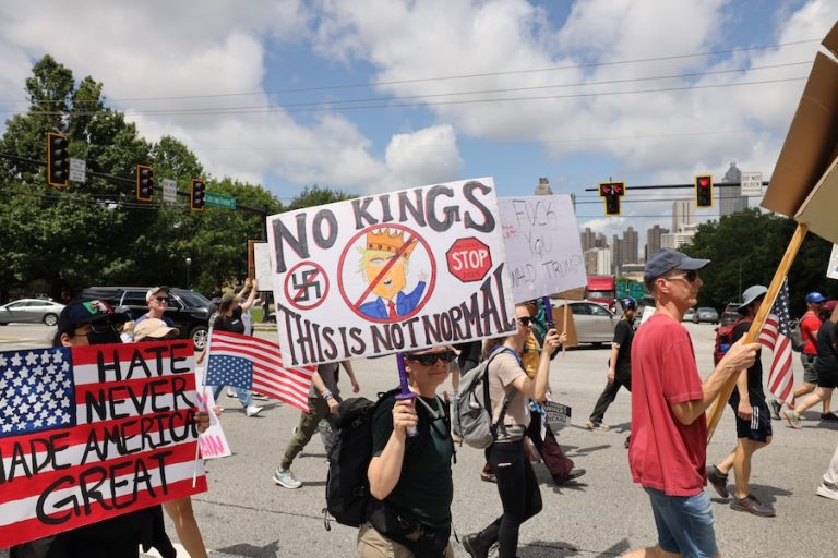 Demonstrators,Hold,Up,Signs,During,The,ìno,Kingsî,Protest,In